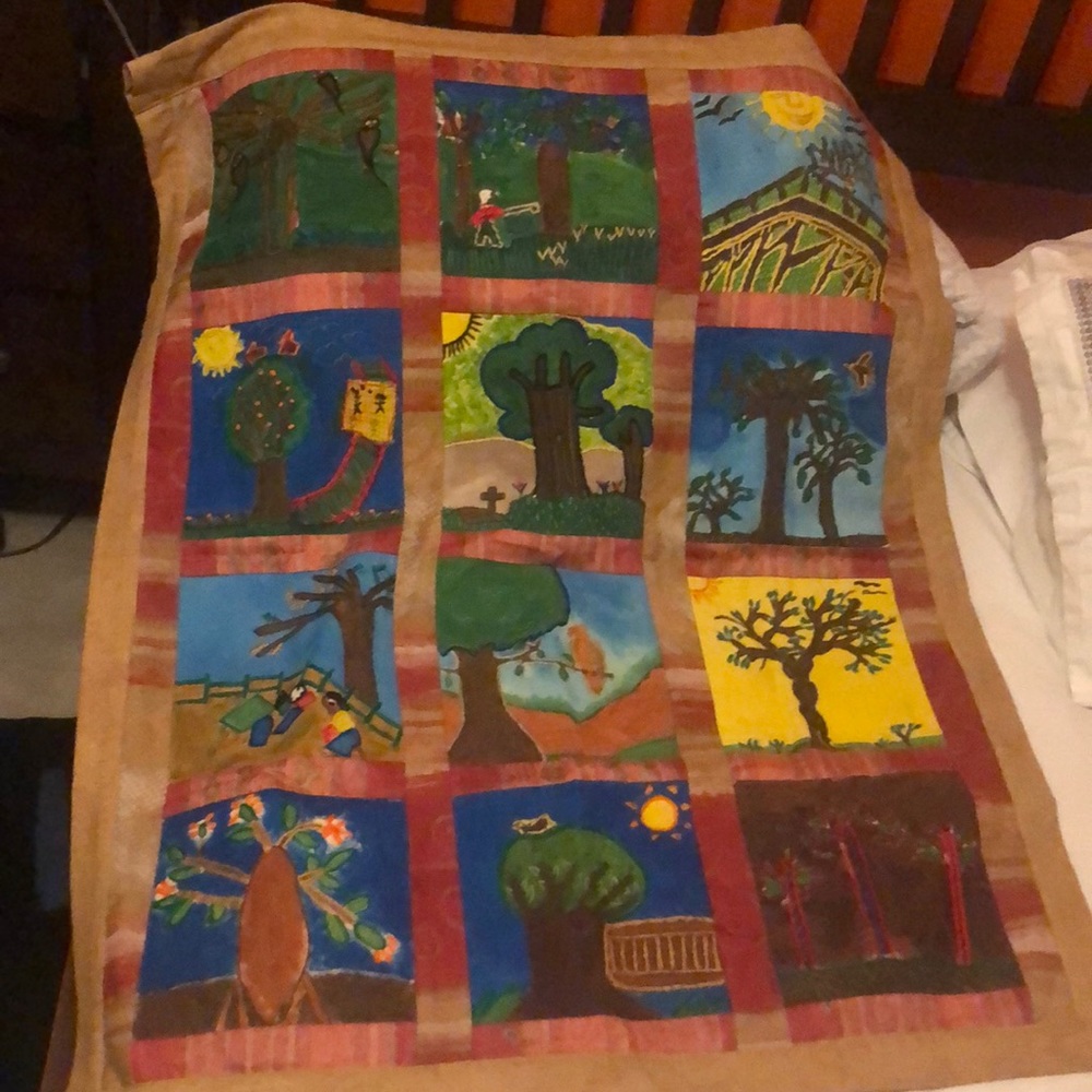 Vintage cotton wall hanging/quilt. Can be draped over a sofa or chair or hang.